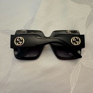 Gucci Black Sunglasses with Gold Accents